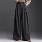 Rosaline | Camel High Waisted Pleated Wide Leg Tailored Satin Trousers — Dark Grey