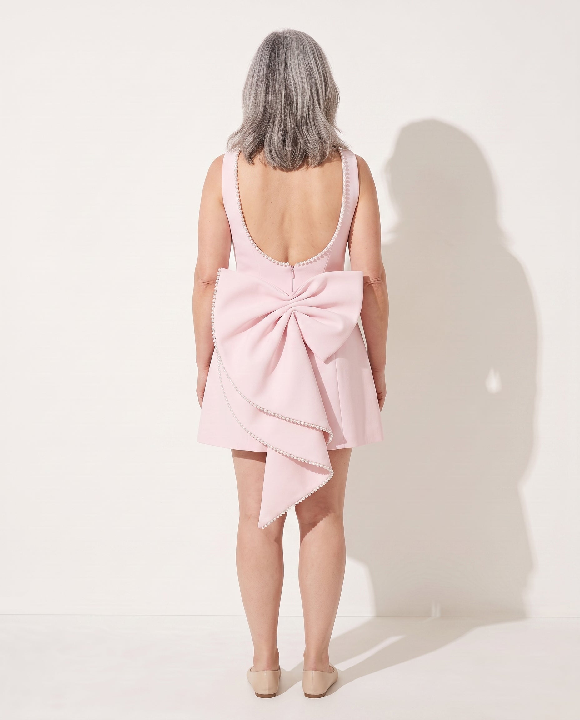 Lucienne | Pearl Neckline Sculpted Mini Dress — achterkant