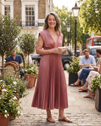 Philippa | Long Sleeve V-Neck Pleated Midi Wedding Guest Dress — lifestyle