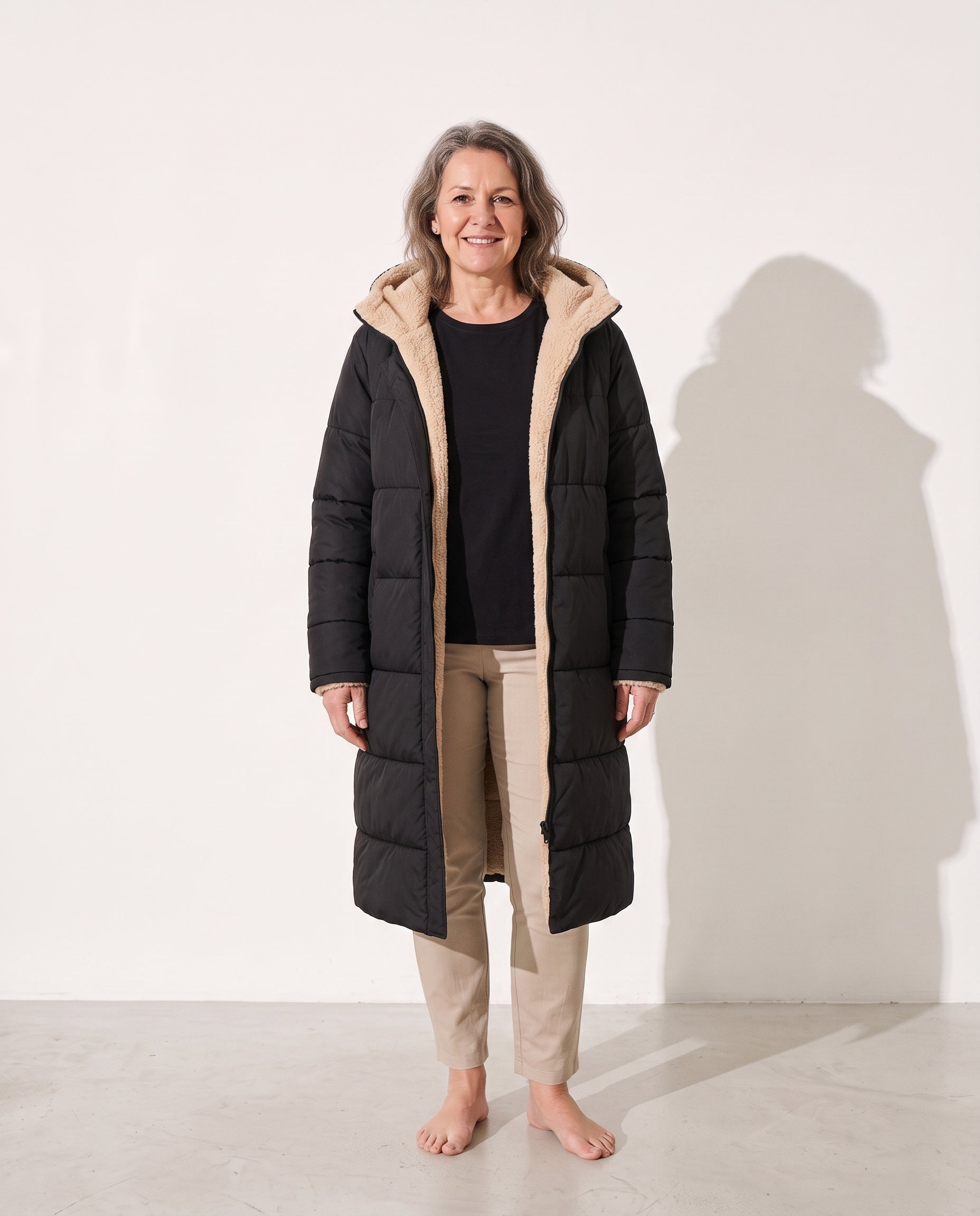 Capucine | Long Black Puffer Longline Coat Winter Commute — voorkant