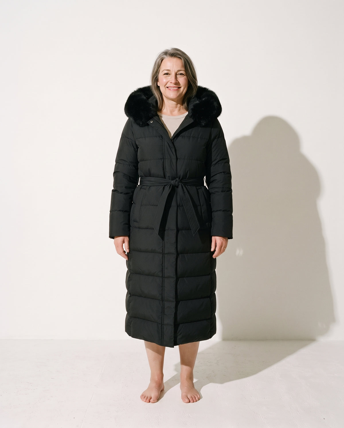 Giselle | Long Black Puffer Coat With Fur Trimmed Hood — voorkant